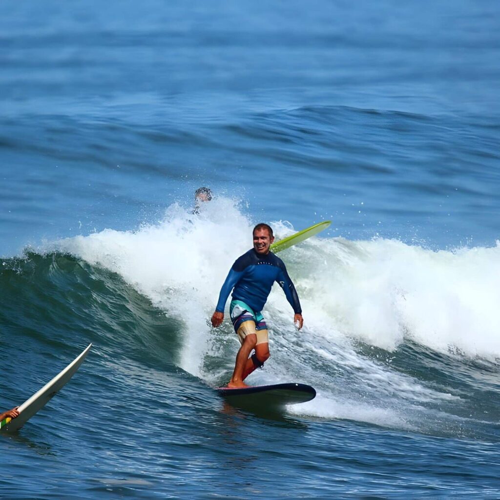 Richard surfing a wave in Peru